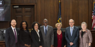 7 people in UofL Brandeis Law's Breit Courtroom