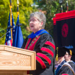 UofL’s 19th president, Dr. Kim Schatzel, at the podium during her inauguration ceremony Sept. 29.