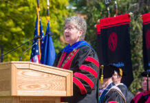 UofL’s 19th president, Dr. Kim Schatzel, at the podium during her inauguration ceremony Sept. 29.