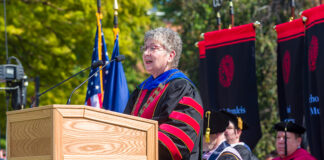 UofL’s 19th president, Dr. Kim Schatzel, at the podium during her inauguration ceremony Sept. 29.