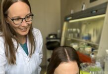 Melissa Smith, left, director of the UofL Sequencing Technology Center, was a lead author on research published in Nature Communications that reveals an underappreciated connection between genetics and our antibodies.