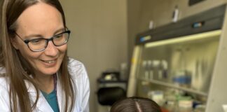 Melissa Smith, left, director of the UofL Sequencing Technology Center, was a lead author on research published in Nature Communications that reveals an underappreciated connection between genetics and our antibodies.