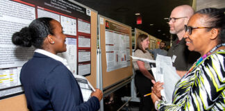 UofL student Leshaia Davis-Johnson and judges Faye Jones and Ryan Simpson