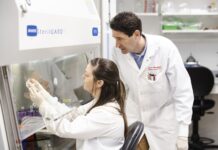 Microbiology and immunology professor Matthew Lawrenz, right, and doctoral student Katelyn Sheneman have received new research funding to better understand how bacteria can outmaneuver the immune system. UofL photo.
