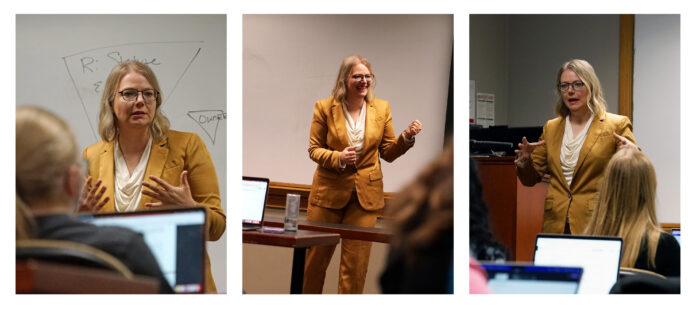 woman teaching in front of a class