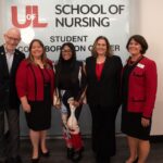 Interim Provost Gerry Bradley, HRSA grant principal investigator Heather Mitchell, scholarship recipient Quinesia James, HRSA grant principal investigator Sara Robertson, School of Nursing Interim Dean Mary DeLetter