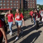 Students walking across campus.