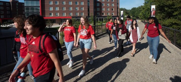 Students walking across campus.