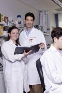 Katelyn Sheneman with mentor Matt Lawrenz, professor of microbiology and immunology