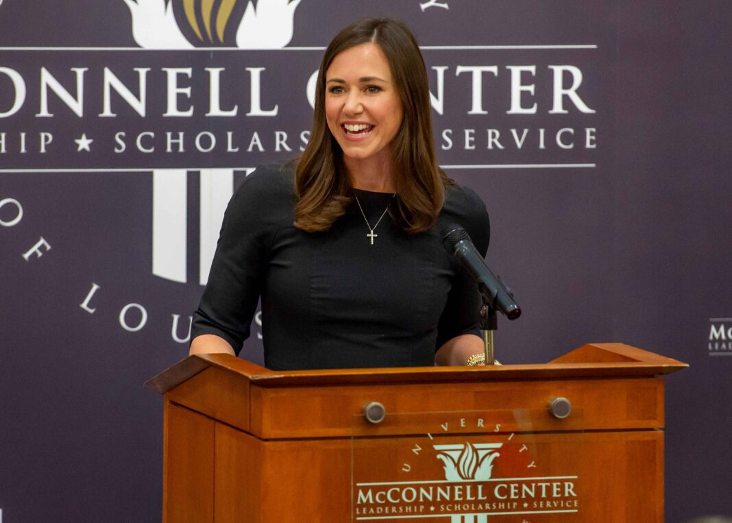 Katie Britt speaks at a podium in the McConnell Center.