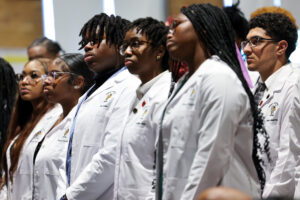 Students in Central High School's Pre-Medical Magnet Program after receiving their white coats. UofL Health photo.