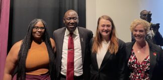Jasmyne Moore and Maggie Fagala receive fellowship awards at the 2023 Breonna Taylor Lecture on Structural Inequity. Pictured are Jasmyne Moore, civil rights attorney Ben Crump, Maggie Fagala and Melanie Jacobs, dean of Brandeis Law School.