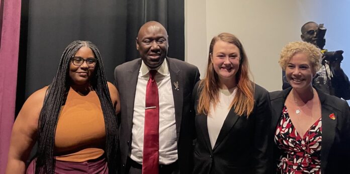 Jasmyne Moore and Maggie Fagala receive fellowship awards at the 2023 Breonna Taylor Lecture on Structural Inequity. Pictured are Jasmyne Moore, civil rights attorney Ben Crump, Maggie Fagala and Melanie Jacobs, dean of Brandeis Law School.