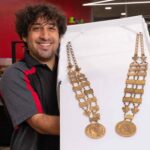 Luis Rodriguez 3D printed a lighter weight replica of the metal medallion necklace worn by UofL's president in commencement and other ceremonies. UofL photo by Ashly Cecil.