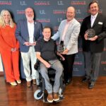 UofL's Kosair for Kids Center for Pediatric NeuroRecovery presented awards to community organizations in May. Left to right: Susan Harkema, Hal Hedley, Todd Crawford, Keith Inman and Chris Williams. UofL photo.