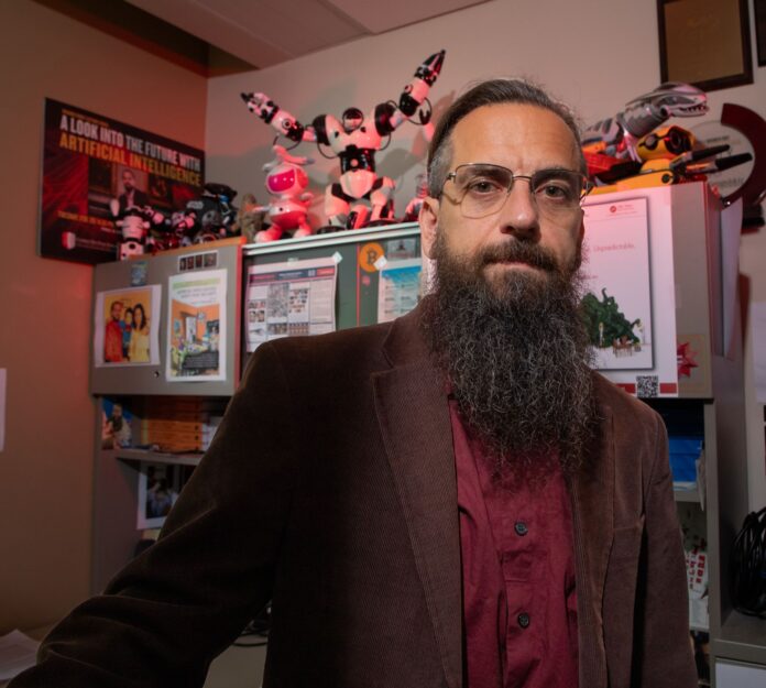 Roman Yampolskiy, associate professor of computer science Roman Yampolskiy, associate professor of computer science, believes artificial superintelligence cannot be controlled, leaving a high probability that a superintelligent AI system could do immense harm to its human creators. Photo by Ashly Cecil.