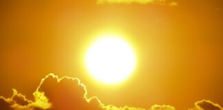The sun rising from behind the clouds. Image from Pexels.com