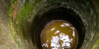 Private well with water.