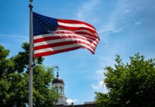 UofL earns top honor for service to military-connected students United States flag on a sunny day.