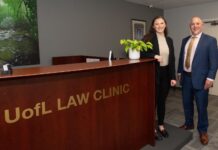UofL Brandeis School of Law launches immigration law clinic Fourth year law student Peyton Rodgers standing beside assistant professor Chris Kozoll.