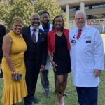 Central High School Principal Tamela Compton, Dwayne Compton, Dr. Edward Miller, Shantel Reed and and Dr. Jeffrey Bumpous, dean and executive vice president for health affairs, University of Louisville School of Medicine.