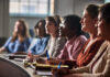 Students listening in the classroom.