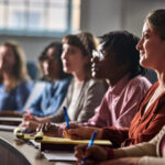 Students listening in the classroom.