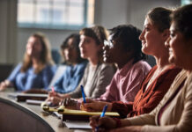 Students listening in the classroom.