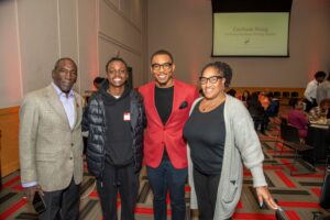 A group of UofL staff and students at the Cardinals Rising reception in April.