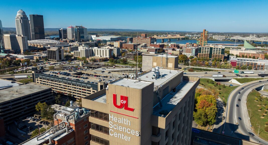 an overhead view of UofL's HSC Campus with the Louisville skyline in the backgroun