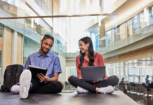 Students reading in the Belknap Academic Building. Photo by Finn Hart.