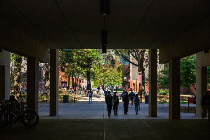UofL General Campus Shot Students walk across campus