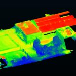 Overhead view of city blocks in blue, red and green shades to show temperature
