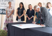 Aruni Bhatnagar, director, Christina Lee Brown Envirome Institute, signing the Greenprint Charter on Aug. 20, 2025.