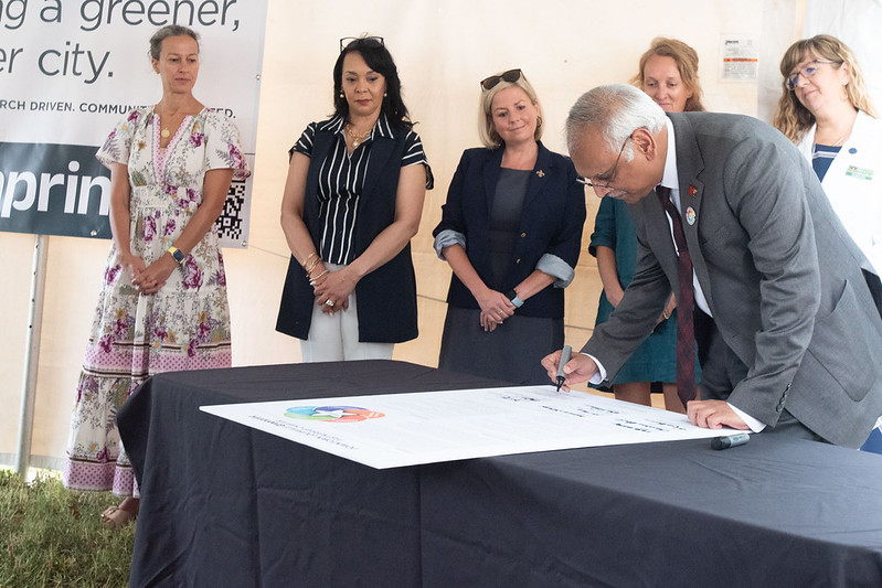 Aruni Bhatnagar, director, Christina Lee Brown Envirome Institute, signing the Greenprint Charter on Aug. 20, 2025.
