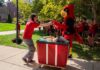 Louie greets those helping with Move-In.