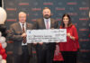UofL Executive Vice President of Health Affairs Jeffrey Bumpous and UofL Health Interim CEO Jason Smith were presented with a check from the WHAS Crusade for Children President and CEO Dawn Lee on Sept. 17, 2025.