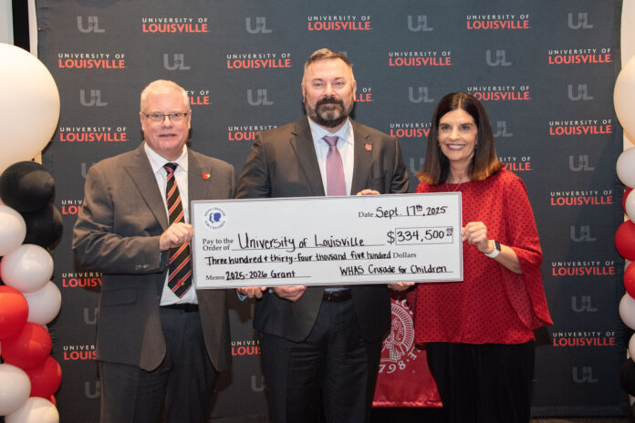 UofL Executive Vice President of Health Affairs Jeffrey Bumpous and UofL Health Interim CEO Jason Smith were presented with a check from the WHAS Crusade for Children President and CEO Dawn Lee on Sept. 17, 2025.