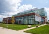 Four-story glass and brick classroom building