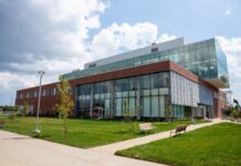 Four-story glass and brick classroom building