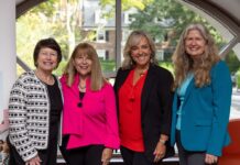 Four social workers at a training at Boston University