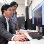 Man and woman at a computer screen