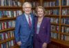 West Virginia’s first elected female senator speaks at UofL’s McConnell Center Man and woman stand in a library with shelves of books behind them.