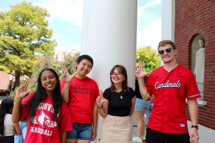UGADM_Photoshoot_Fall25_19_reduced Four students on campus with