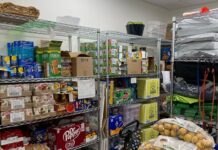 The shelves in the Cardinal Cupboard, a free food pantry on campus for all students, faculty, and staff.