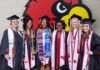 UofL graduates in commencement regalia.