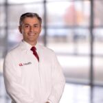 Unique statistical approach lends promise to therapies for rare childhood brain cancer Man in white medical coat