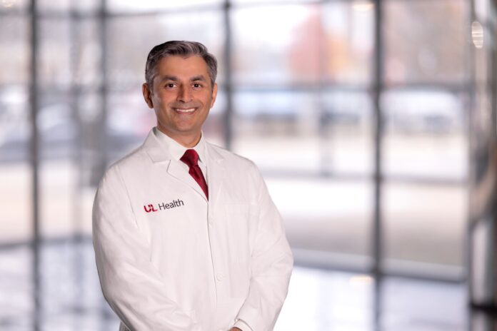 Man in white medical coat