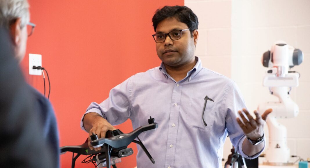 UofL chosen to operate new Defense Innovation OnRamp Hub Man holding drone