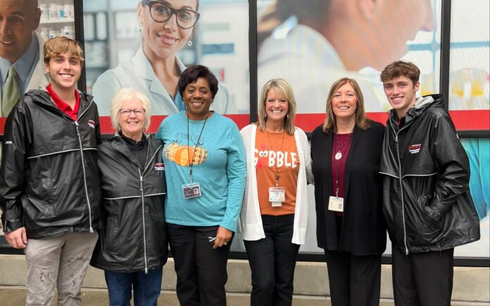 food drive-3 Group of staff and students together in front of the UofL Ambulatory Care Building.
